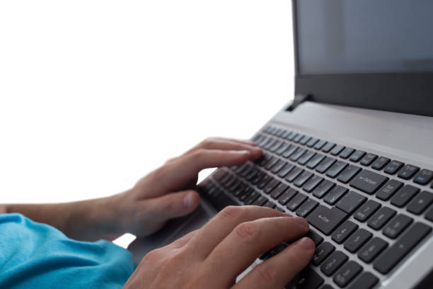 istock Man's hands typing on laptop notebook keyboard isolated on white background. Man browsing information on internet. Freelance blogging, it support concept 885970702