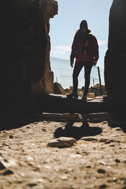 Woman on the ancient gate