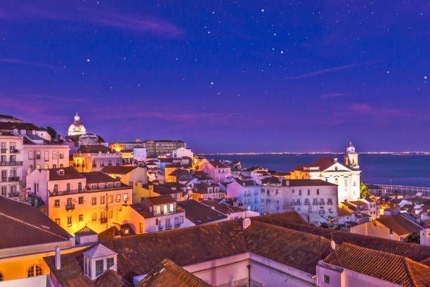 istock Alfama district in Lisbon at night 885981048