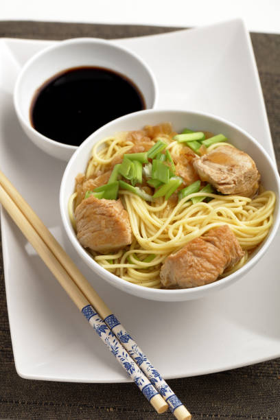 istock Udon noodle soup with chicken and soy sauce 885992352