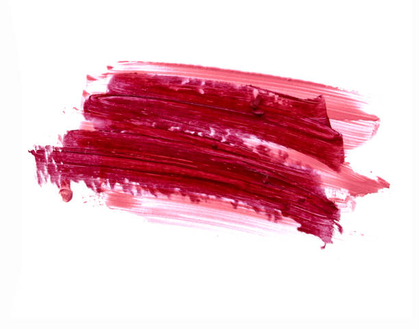 istock Red lipstick smeared on white. Cosmetic product. 885998034