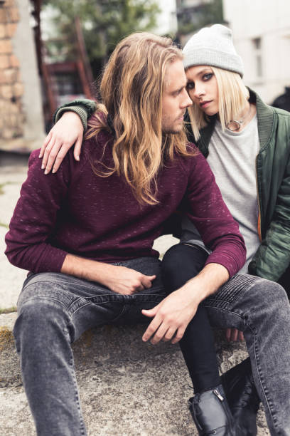 istock couple sitting outdoors 886001092