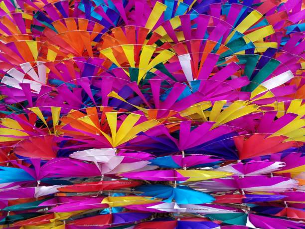 istock Colorful toy windmills backgrounds 886013254