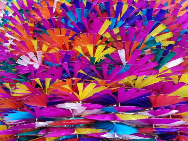 istock Colorful toy windmills backgrounds 886013262