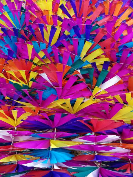 istock Colorful toy windmills backgrounds 886013314