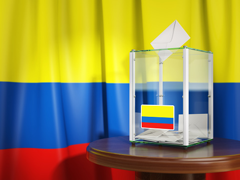 Ballot box with flag of Colombia  and voting papers. Colombian presidential or parliamentary election. 3d illustration