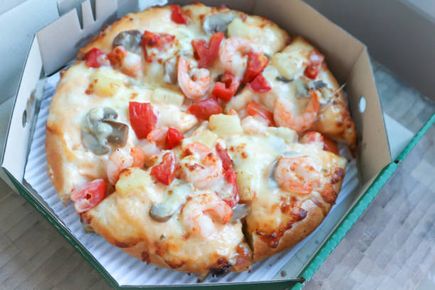 istock shrimp pizza in the box 886016466