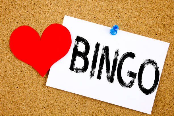 istock Conceptual hand writing text caption inspiration showing Bingo concept for Lettering Gambling to Win Price Success and Love written on sticky note, reminder cork background with copy space 886023026