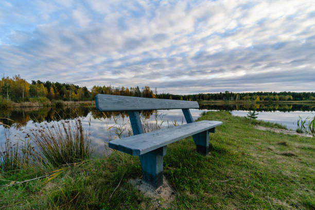 istock lake with water reflections in colorful autumn day 886023224