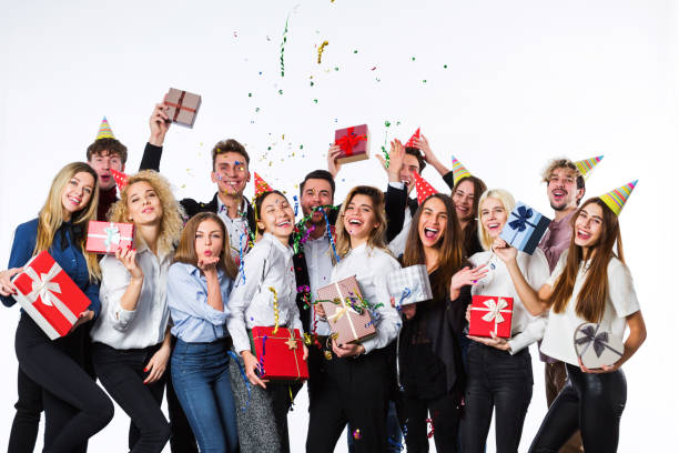 istock Holiday. Young beautiful people having fun on a white background. 886035454
