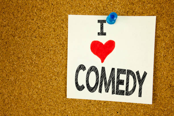 istock Hand writing text caption inspiration showing I Love Comedy concept meaning Stand Up Comedy Microphone Loving written on sticky note, reminder isolated background with copy space 886038982