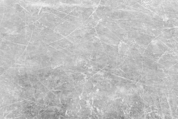 White ice and snow at ice rink as background