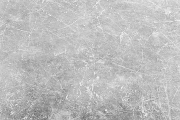 istock White ice and snow at ice rink as background 886045676