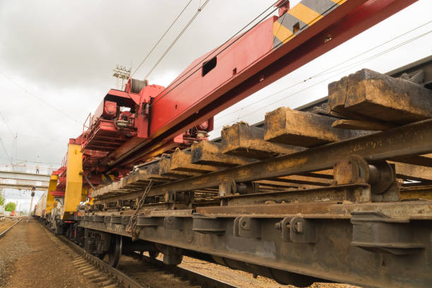 istock Railway tracklayers ready to lay the rails 886051242