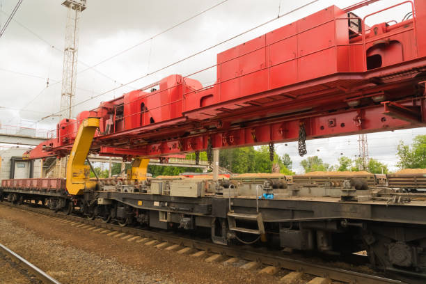 istock Railway tracklayers ready to lay the rails 886051412