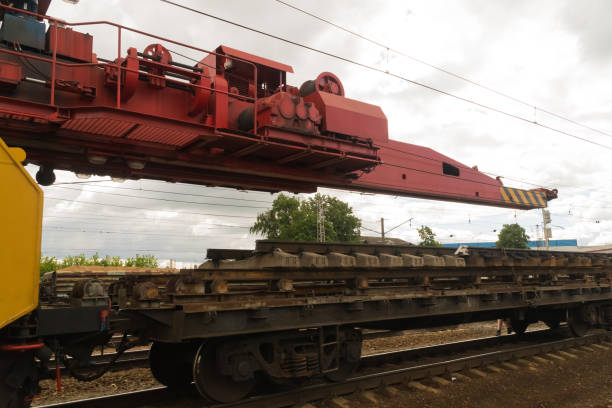 istock Railway tracklayers ready to lay the rails 886051438