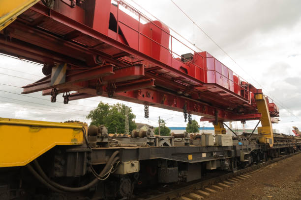 istock Railway tracklayers ready to lay the rails 886051474