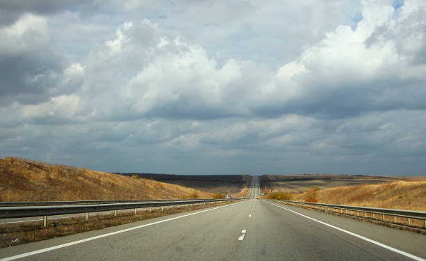 istock Highway Odessa-Kiev a day with partial cloudiness 886051804