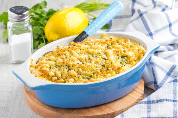 Casserole with crispy crumble, potato gratin, baked meat butter cheese dish, tasty homemade dinner stock photo