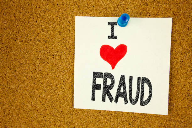 istock Hand writing text caption inspiration showing Fraud concept meaning Criminal hacker security prevention and Love written on sticky note, reminder isolated background with copy space 886084542