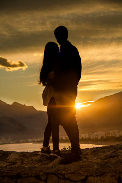 istock Romantic couple in the autumn Park 886089094
