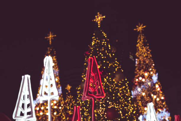 istock Blurred bokeh lights christmas tree decorated with colorful. Abstract background for design. copy space. 886089348