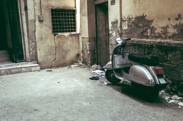 istock A scooter parked in an empty street 886092656