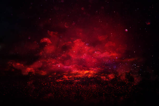 istock black and red glitter lights background. defocused. 886098060