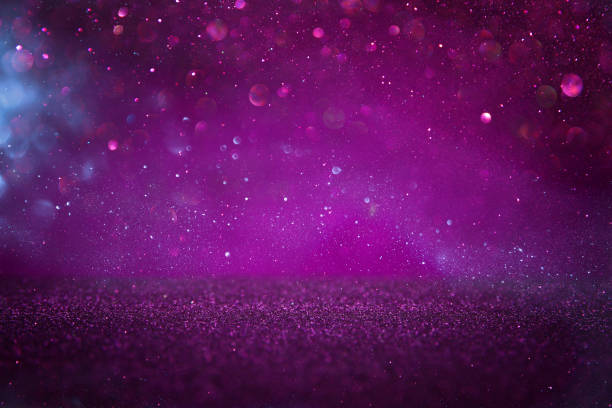 istock Purple glitter lights background. defocused. 886098164