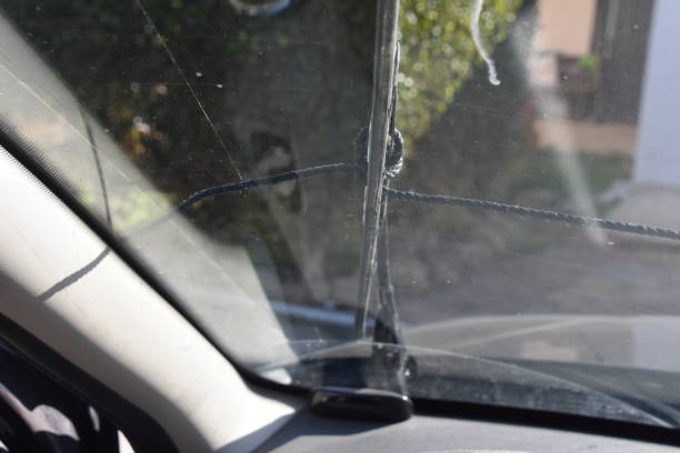 istock Concept of improvisation - windshield wiper connected to a wire for manual operation 886098428