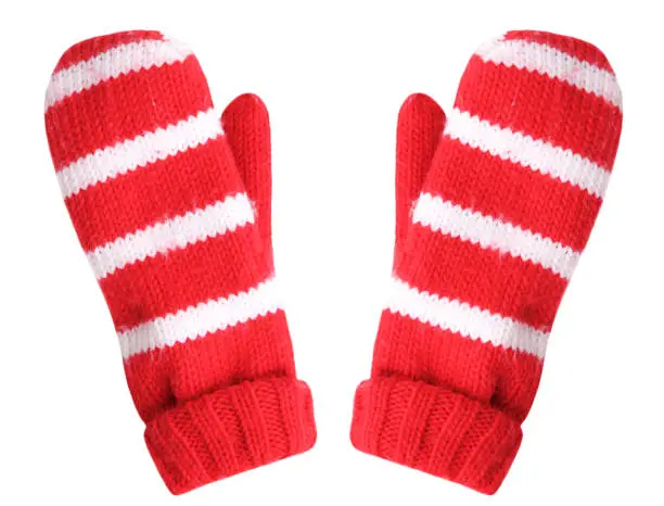 Red white christmas pair gloves isolated.Winter fashion mittens.
