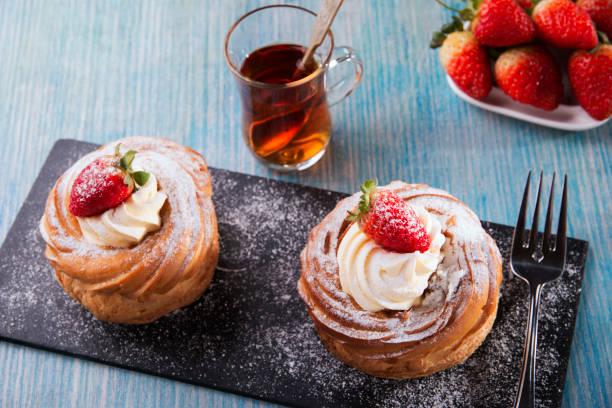 istock cake with custard and strawberries whipped cream 886110562