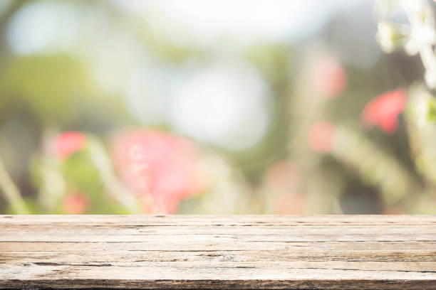 istock Selective focus empty wooden table on blured sweet pastel vintage bokeh background. 886118562