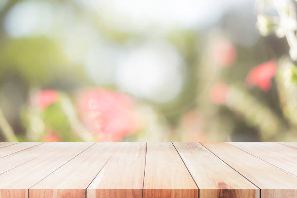 istock Selective focus empty wooden table on blured sweet pastel vintage bokeh background. 886118568