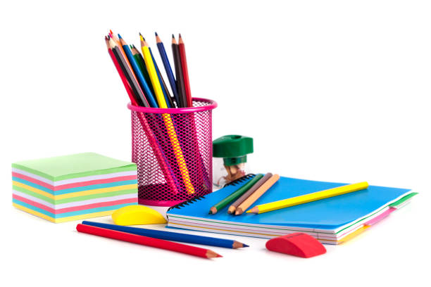 istock colored pencils in the basket, Eraser and pencil sharpener on white background 886122262