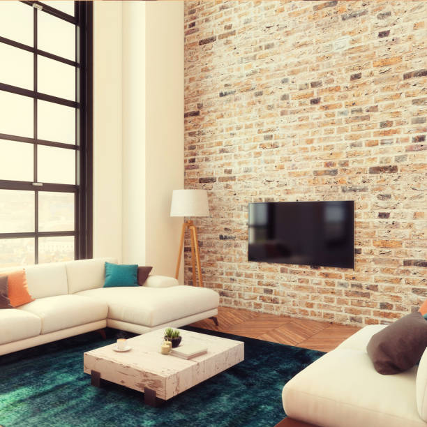 istock loft apartment living room with large TV LED screen 886124834