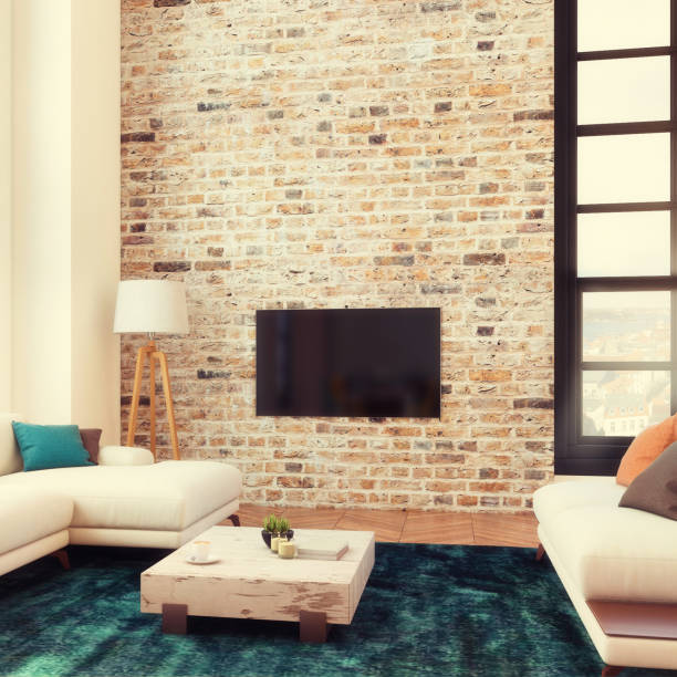 istock loft apartment living room with large TV LED screen 886124848