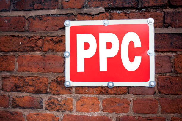 istock Hand writing text caption inspiration showing PPC - Pay per Click concept meaning Internet SEO Money written on old announcement road sign with background and copy space 886126092
