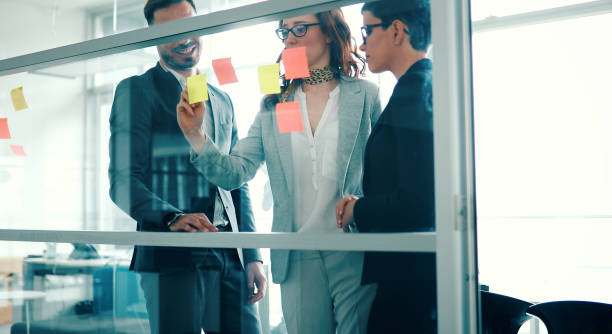 istock Business colleagues in conference room 886128760
