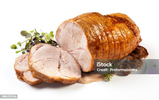 Roasted Pork With Sauce And Garnish Stock Photo - Download Image Now - Pork, Roasted, Ham