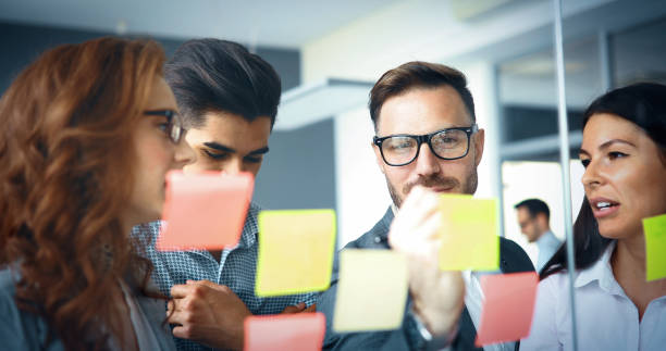 istock Creative business people working on business project in office 886131394