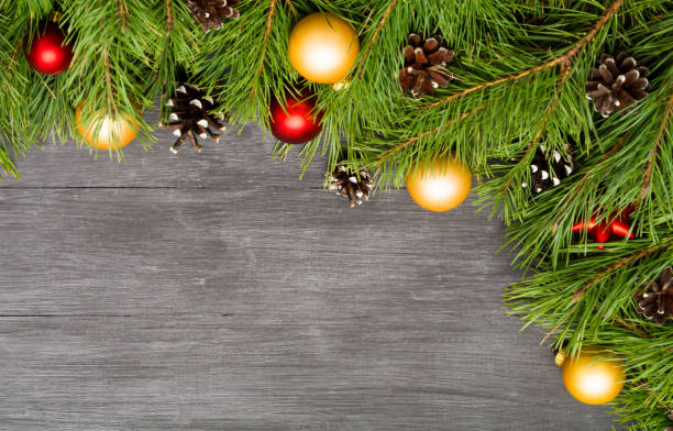 istock Christmas decoration, garland frame background, top view with copy space on black wood table 886134678