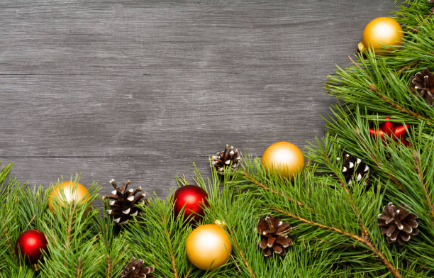 istock Christmas decoration, garland frame background, top view with copy space on black wood table 886134762