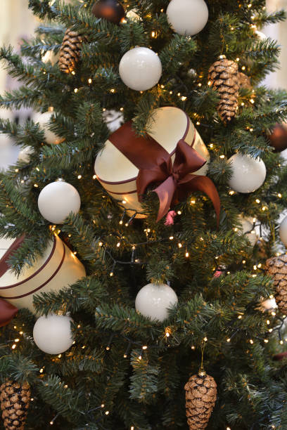 istock Christmas tree decorated with Christmas balls and gift boxes 886134788