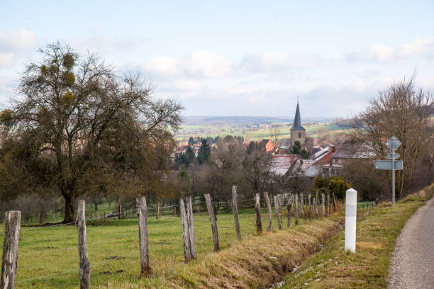 istock Village with church 886138284