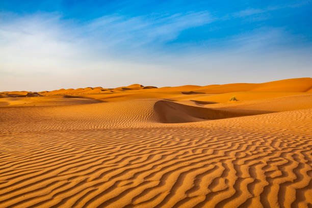 wave pattern desert landscape, oman stock photo