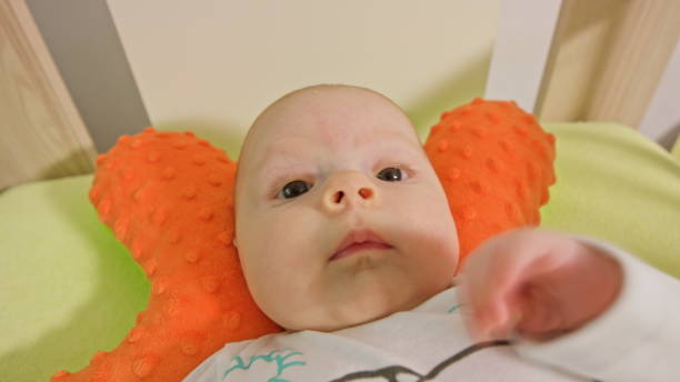 istock Sweet baby is lying on a back 886160376