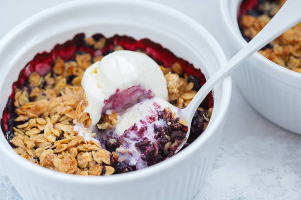 istock Berry crumble dessert with cream ice-cream 886160714