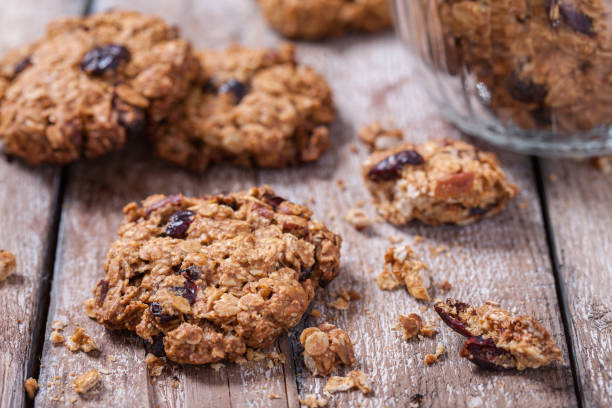 istock Delicious oatmeal cookies with pecan nuts and dried cranberries 886180108