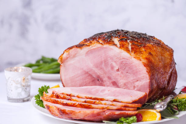 istock Christmas Roasted glazed holiday pork ham 886182720